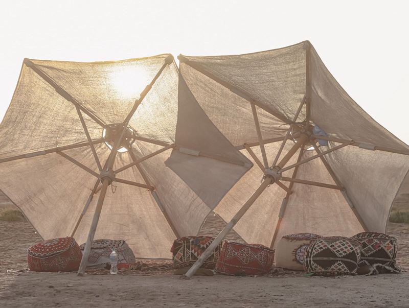 Shade tents with cushions on an island beach